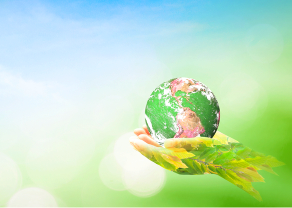 hands holding the planet symbolizing corporate social responsibility