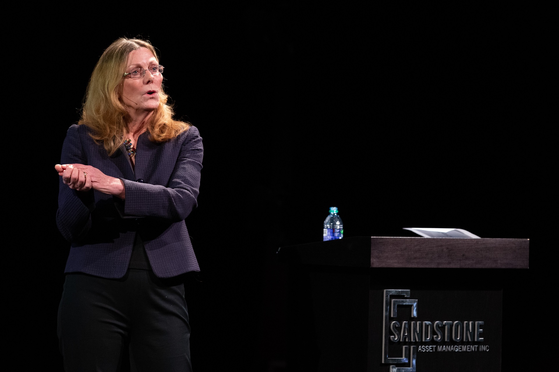 Sharon Watkins speaking on stage at OUTLOOK 2019